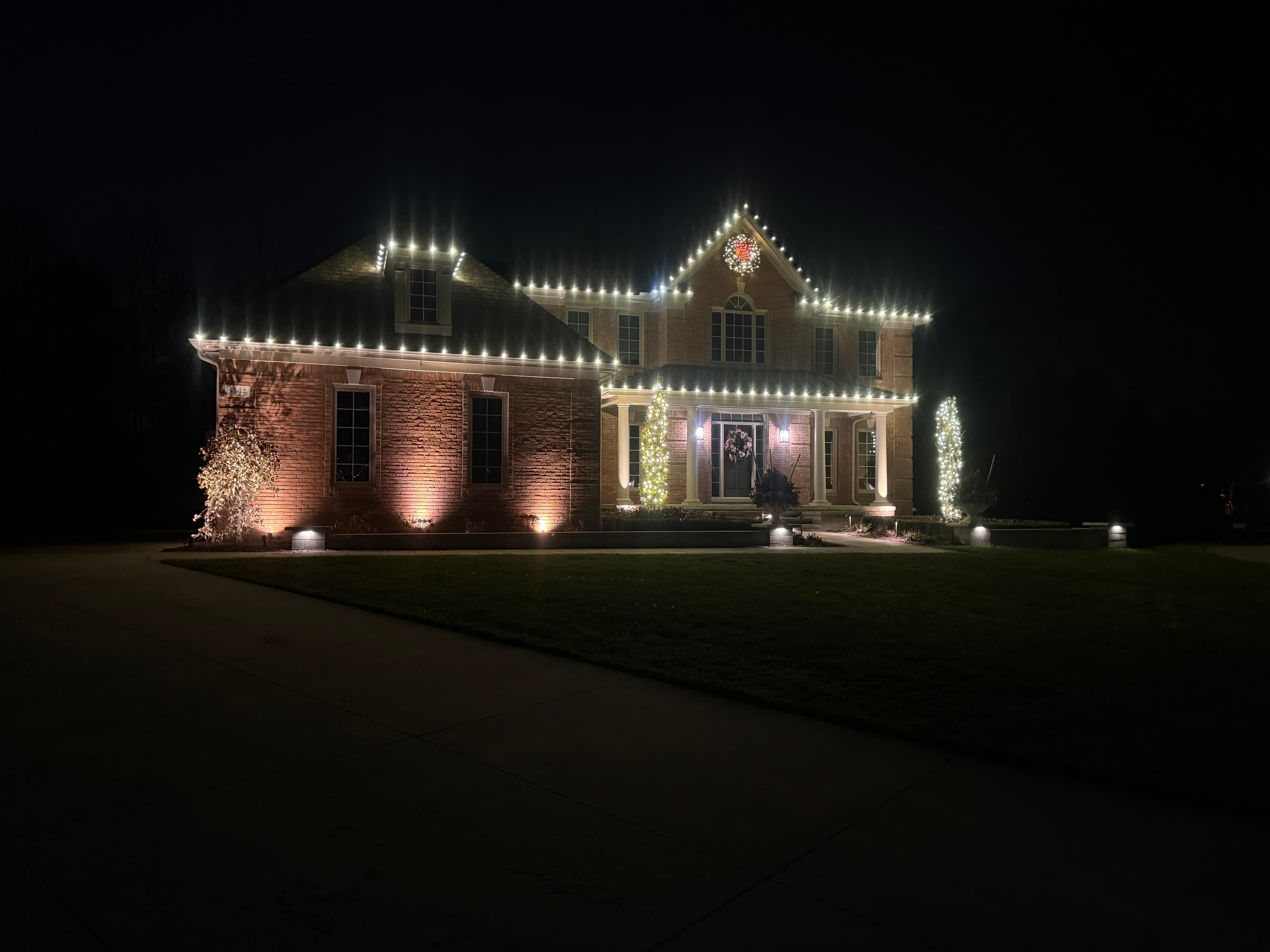 Custom Christmas light design consultation for a home